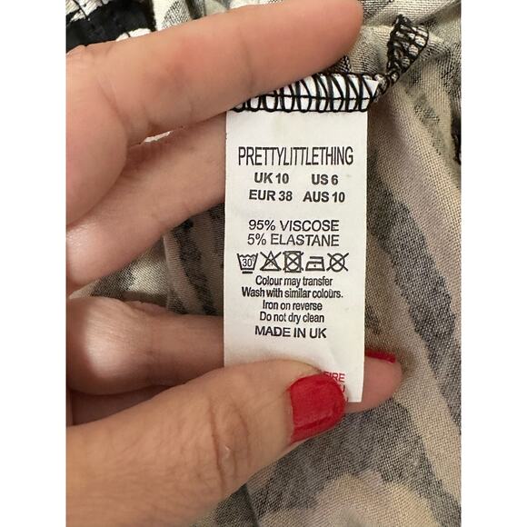 Pretty Little Thing cream black zebra print pull on mini skirt size 6 - Picture 4 of 11